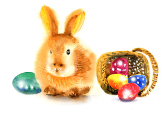 a small, beautiful Easter bunny sitting next to a basket of Easter eggs