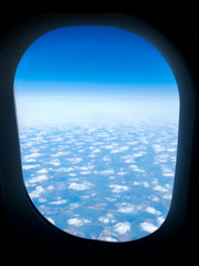 top view of the earth and clouds from an airplane