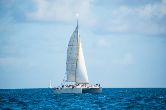 Catamaran with tourists in Caribbean sea