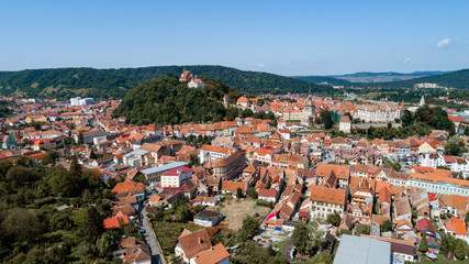 Aerial footage of an old eastern Europe   town on a sunny day