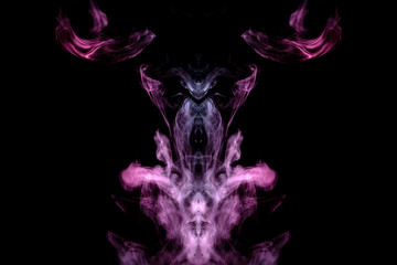 Fototapeta na wymiar Smoke of different blue, red and pink colors in form of horror in the shape of the head, face and eye with wings on a black isolated background. Soul and ghost in mystical symbol. Print for clothes.