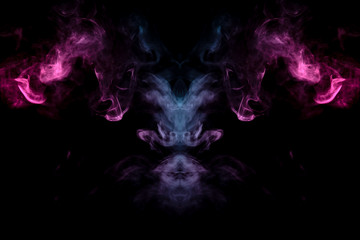 Smoke of different blue, red and pink colors in form of horror in the shape of the head, face and eye with wings on a black isolated background. Soul and ghost in mystical symbol. Print for clothes.