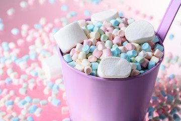 Close up of various colorful marshmallows.