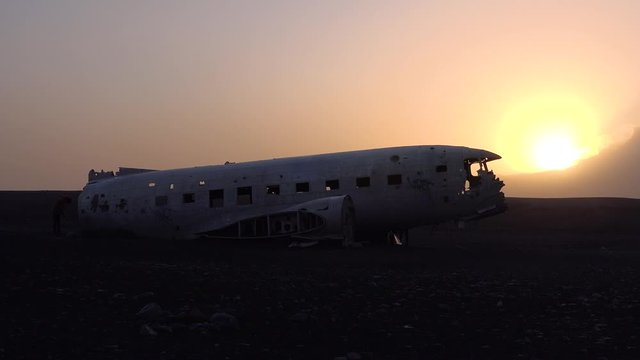 Silhouette of a crashed U.S. Navy DC-3 on the black sands of Solheimasandur, Iceland.