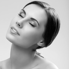 Fototapeta premium young woman with closed eyes