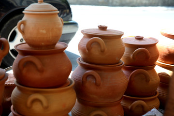 Fototapeta na wymiar Traditional Azerbaijan handmade clay pots from Sheki at the market 