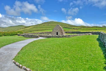 The Gallarus Oratory in sunshine -  a chapel located on the Dingle Peninsula, County Kerry, Ireland.