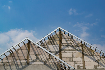Fototapeta na wymiar Unfinished house gable roof structure