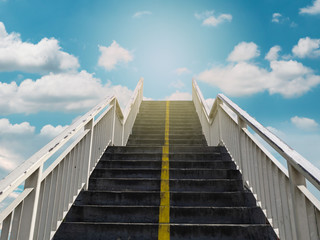 stairs leading to the bright sky
