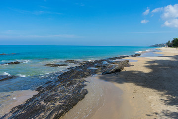 Beautiful beach and rock with blue sky in Koh Lanta, Thailand.