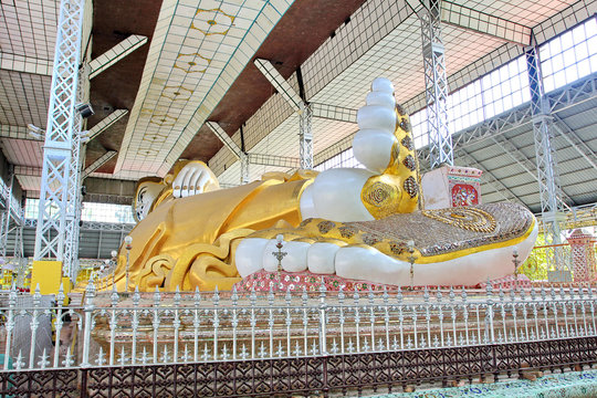 Reclining buddha image shwethalyaung are Beautiful Reclining and are famous tourist attraction in bago, myanmar.