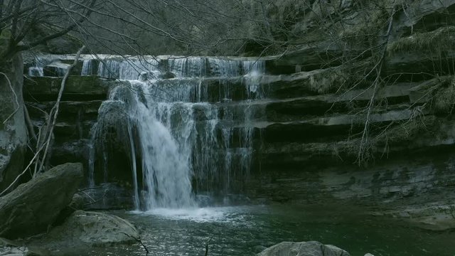 Stream water flowing in natural cascade