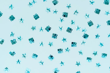 Fototapeta premium Creative festive background from sky blue stars. Flat lay. New year concept. Open composition 