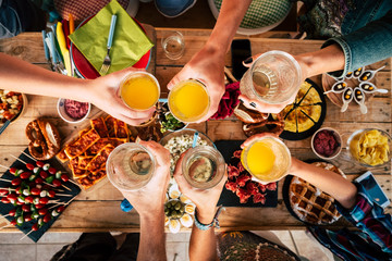 Group of friend mixed ages  generations from children to adult have fun togeter with food and...