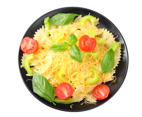 farfalle pasta isolated on white background, plate of pasta. top view
