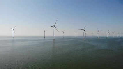 Wind turbine from aerial view, Drone view at windpark westermeerdijk a windmill farm in the lake IJsselmeer the biggest in the Netherlands,Sustainable development, renewable energy