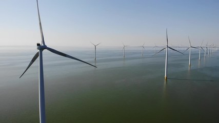 Wind turbine from aerial view, Drone view at windpark westermeerdijk a windmill farm in the lake IJsselmeer the biggest in the Netherlands,Sustainable development, renewable energy