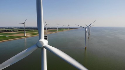 Wind turbine from aerial view, Drone view at windpark westermeerdijk a windmill farm in the lake IJsselmeer the biggest in the Netherlands,Sustainable development, renewable energy