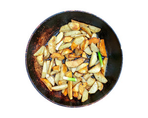 Cooking fried potatoes with onions in a pan. Products on a white background.