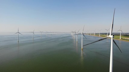 Wind turbine from aerial view, Drone view at windpark westermeerdijk a windmill farm in the lake IJsselmeer the biggest in the Netherlands,Sustainable development, renewable energy