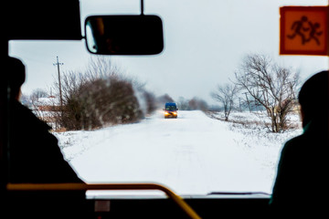 Transportation in winter. Winter road from bus window_