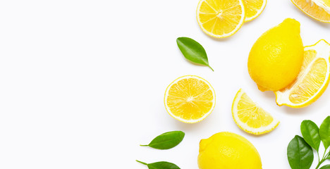 Fototapeta premium Fresh lemon and slices with leaves isolated on white