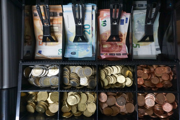 cash of money at the checkout shop