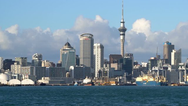 Auckland, New Zealand harbour and city center with Auckland Sky Tower waterfront view from Devonport. Travel attraction in Auckland, New Zealand.