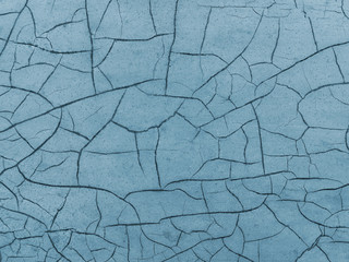 Cracked paint on wooden background, texture. Vintage wallpaper