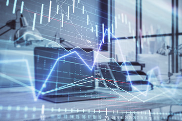Forex graph hologram with desktop office computer background. Double exposure. Concept of financial analysis.