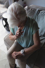 Senior woman checking time