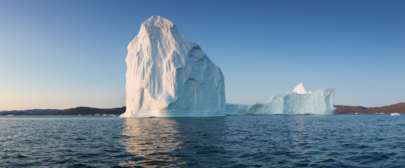 Huge icebergs of different forms in the Disko Bay, West Greenland. Their source is by the...