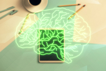 Double exposure of human brain drawing on digital tablet, table background. Concept of data analysis