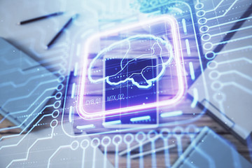 Double exposure of human brain drawing on digital tablet, table background. Concept of data analysis