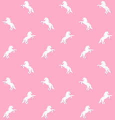 Vector seamless pattern of white unicorn silhouette isolated on pastel pink background