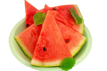 Fresh juicy watermelon berry in a plate isolated on white
