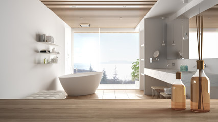 Wooden table top or shelf with aromatic sticks bottles over blurred modern minimalist luxury bathroom with bathtub and panoramic window, white architecture interior design