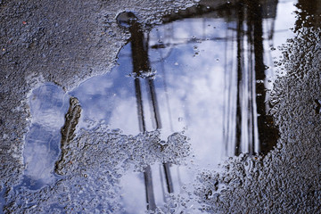 wet concrete road with water reflection at after rain