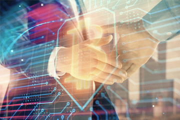 Double exposure of crypto economy theme drawing on cityscape background with handshake. Concept of partnership and blockchain