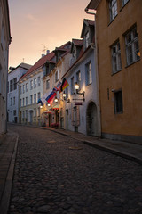Fototapeta na wymiar Cozy evening street of the old city of Tallinn.