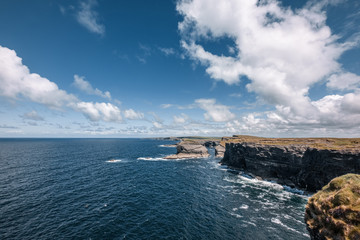 Fototapeta na wymiar Kilkee cliffs and stacks on west coast of Ireland