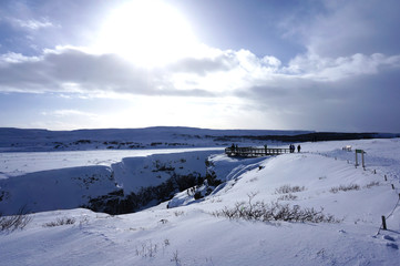 Fototapeta na wymiar Winter landscape with mountains and blue sky