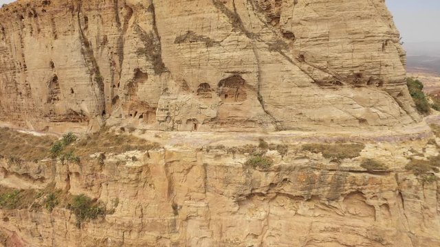 Rotating drone shot of historic rock-hewn church of Maryam Korkor in the Tigray region in Ethiopia
