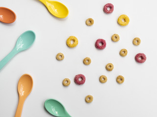 Cute coloured fruity loops and spoons