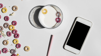 Cereals and technology on a morning breakfast