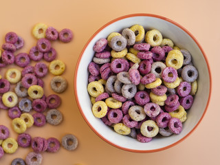 Close-up bowl with delicious coloured cereals