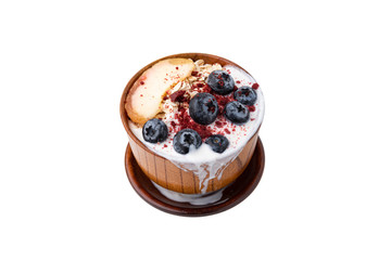 Granola, oatmeal with milk, peach and blue berry on isolated white background