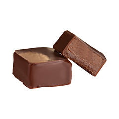 Cut luxury handmade candy with chocolate ganache isolated on white background