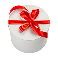 White round cartoon gift box with red bow isolated on white background