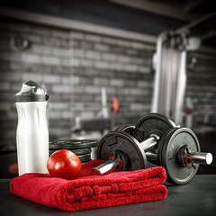 Desk of free space and gym interior. 